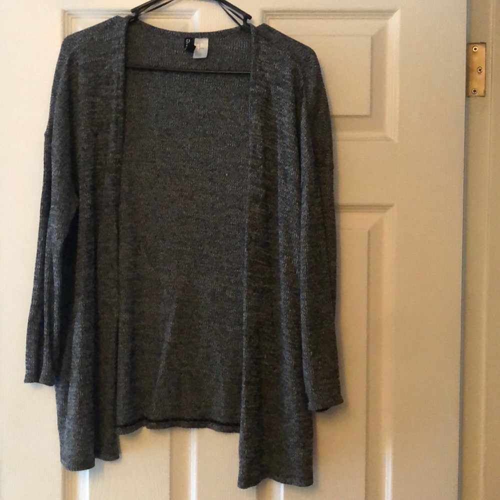 Divided- lightly worn sweater- size medium- black and white